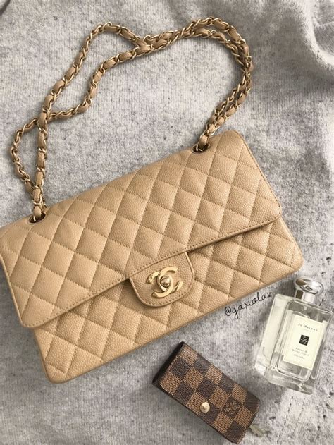 chanel classic flap black or beige|original Chanel classic flap bag.